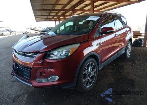 2014 Ford Escape Titanium z USA, uszkodzony, nr VIN 1FMCU0J9XEUA04504